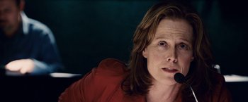 Movie still from “Vantage Point” (2008), directed by Pete Travis – A person with a microphone; Close Up shot, Low angle