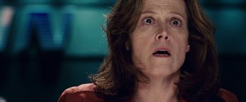 Movie still from “Vantage Point” (2008), directed by Pete Travis – An older woman looking up at the sky; Close Up shot, Low angle