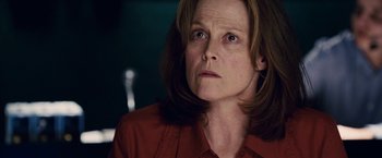 Movie still from “Vantage Point” (2008), directed by Pete Travis – A person with long brown hair; Close Up shot, Low angle