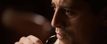 Movie still from “Vantage Point” (2008), directed by Pete Travis – A person holding a cell phone; Extreme Close Up shot, Low angle