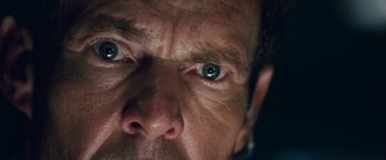 Movie still from “Vantage Point” (2008), directed by Pete Travis – A man's eyes and face; Extreme Close Up shot, Overhead angle