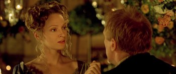 Movie still from “Vatel” (2000), directed by Roland Joffé – A man and a woman are looking at one another; Close Up shot, Over the shoulder angle