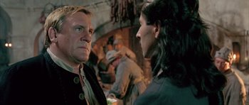 Movie still from “Vatel” (2000), directed by Roland Joffé – A man and a woman are talking to each other in front of a fireplace; Close Up shot, Over the shoulder angle