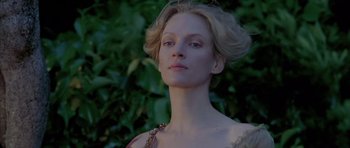 Movie still from “Vatel” (2000), directed by Roland Joffé – A beautiful woman with blonde curly hair wearing a dress; Close Up shot, Low angle