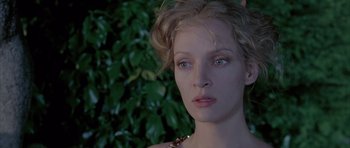 Movie still from “Vatel” (2000), directed by Roland Joffé – A woman's face in front of a bush; Close Up shot, Over the shoulder angle