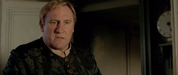 Movie still from “Vatel” (2000), directed by Roland Joffé – A person wearing a jacket; Close Up shot, Low angle