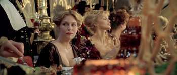Movie still from “Vatel” (2000), directed by Roland Joffé – A group of people sitting at a table; Close Up shot, Over the shoulder angle