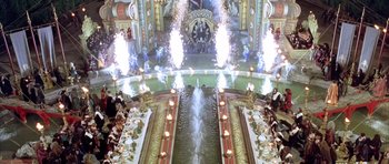 Movie still from “Vatel” (2000), directed by Roland Joffé – An aerial view of a banquet hall with a fountain; Extreme Wide shot, High angle