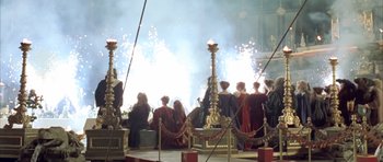 Movie still from “Vatel” (2000), directed by Roland Joffé – A group of people sitting in front of fireworks; Extreme Wide shot, High angle