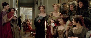 Movie still from “Vatel” (2000), directed by Roland Joffé – A group of women standing next to each other in a room; Medium shot, Low angle