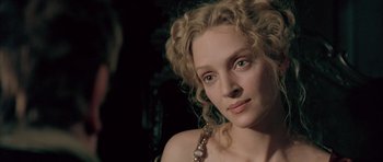 Movie still from “Vatel” (2000), directed by Roland Joffé – A person with curly hair; Close Up shot, Over the shoulder angle