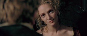 Movie still from “Vatel” (2000), directed by Roland Joffé – A person with curly hair; Close Up shot, Over the shoulder angle