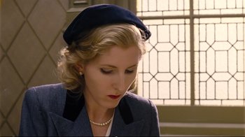 Movie still from “Vera Drake” (2004), directed by Mike Leigh – A woman wearing a hat and a jacket; Close Up shot, High angle