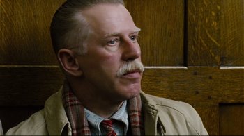 Movie still from “Vera Drake” (2004), directed by Mike Leigh – An older man with a beard and a mustache; Close Up shot, Low angle