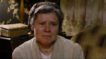 Movie still from “Vera Drake” (2004), directed by Mike Leigh – An older woman with a sad look on her face; Close Up shot, Low angle