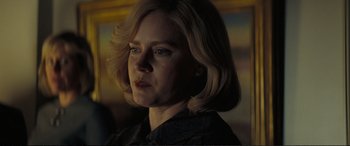 Movie still from “Vice” (2018), directed by Adam McKay – A person with blonde hair; Close Up shot, Low angle