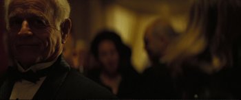 Movie still from “Vice” (2018), directed by Adam McKay – A group of people standing in a room; Close Up shot, Over the shoulder angle