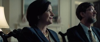 Movie still from “Vice” (2018), directed by Adam McKay – A person sitting in a chair; Close Up shot, Over the shoulder angle