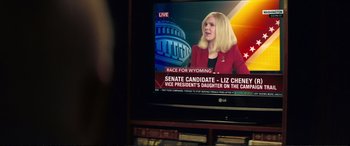 Movie still from “Vice” (2018), directed by Adam McKay – A television screen with a woman on it; Close Up shot, Over the shoulder angle