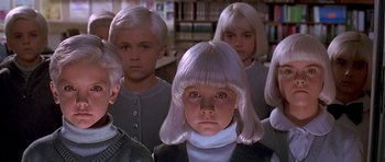 Movie still from “Village of the Damned” (1995), directed by John Carpenter – A group of young children in a library; Close Up shot, High angle
