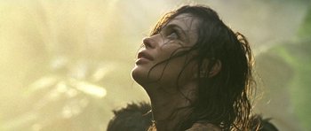 Movie still from “Vinyan” (2008), directed by Fabrice du Welz – A person looking up at the sky; Close Up shot, Low angle