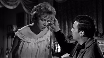 Movie still from “Viridiana” (1961), directed by Luis Buñuel – An old photo of a man and a woman; Close Up shot, High angle