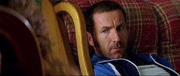 Movie still from “Volver” (2006), directed by Pedro Almodóvar – A person laying on a chair; Close Up shot, Over the shoulder angle