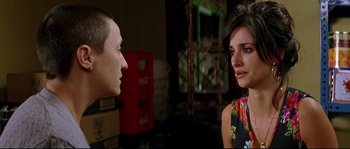 Movie still from “Volver” (2006), directed by Pedro Almodóvar – A man and a woman looking at each other; Close Up shot, Over the shoulder angle