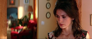 Movie still from “Volver” (2006), directed by Pedro Almodóvar – A woman holding a cell phone in her hand; Close Up shot, Over the shoulder angle