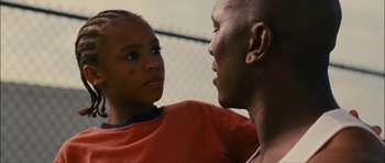 A man and a boy looking at one another