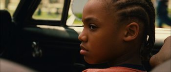 Movie still from “Waist Deep” (2006), directed by Vondie Curtis-Hall – A person sitting in a car; Close Up shot, Over the shoulder angle