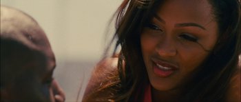 Movie still from “Waist Deep” (2006), directed by Vondie Curtis-Hall – A woman's face with long brown hair; Close Up shot, High angle