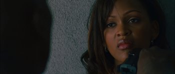 Movie still from “Waist Deep” (2006), directed by Vondie Curtis-Hall – A person with long brown hair; Close Up shot, Low angle