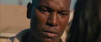 Movie still from “Waist Deep” (2006), directed by Vondie Curtis-Hall – A person's face; Close Up shot, High angle