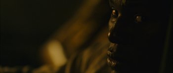 Movie still from “Waist Deep” (2006), directed by Vondie Curtis-Hall – The face of a man in the dark; Extreme Close Up shot, High angle