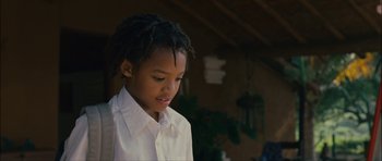 Movie still from “Waist Deep” (2006), directed by Vondie Curtis-Hall – A young man with dreads standing in a room; Close Up shot, Low angle