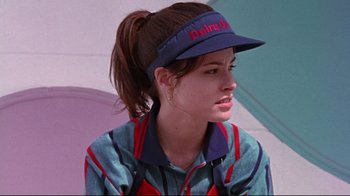 Movie still from “Waiting for Guffman” (1996), directed by Christopher Guest – A woman wearing a blue hat and a blue shirt; Close Up shot, Low angle