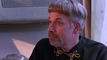 Movie still from “Waiting for Guffman” (1996), directed by Christopher Guest – A man wearing a bow tie and looking to his left; Close Up shot, Low angle