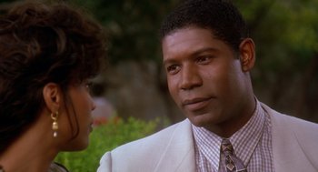 Movie still from “Waiting to Exhale” (1995), directed by Forest Whitaker – A man and a woman talking to each other; Close Up shot, Over the shoulder angle