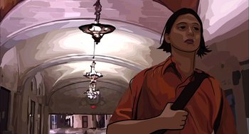 Movie still from “Waking Life” (2001), directed by Richard Linklater – A man standing in front of a ceiling light; Medium shot, Low angle