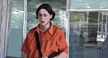 Movie still from “Waking Life” (2001), directed by Richard Linklater – A woman in an orange shirt is holding a gun; Close Up shot, Low angle