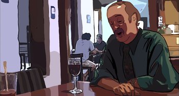Movie still from “Waking Life” (2001), directed by Richard Linklater – A man sitting at a table in front of a glass of wine; Close Up shot, Over the shoulder angle