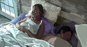 Movie still from “Waking Life” (2001), directed by Richard Linklater – A woman laying in bed next to a sleeping man; Medium shot, Overhead angle