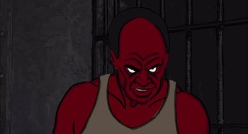 Movie still from “Waking Life” (2001), directed by Richard Linklater – An evil looking man in a red shirt; Close Up shot, High angle