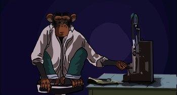 Movie still from “Waking Life” (2001), directed by Richard Linklater – A monkey sitting in front of a computer monitor; Medium shot, Low angle