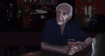 Movie still from “Waking Life” (2001), directed by Richard Linklater – An older man sitting at a table with a drink; Close Up shot, Low angle