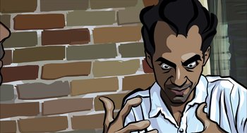 Movie still from “Waking Life” (2001), directed by Richard Linklater – A man with his hand raised in front of a brick wall; Extreme Close Up shot, Low angle