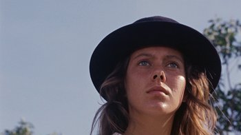 Movie still from “Walkabout” (1971), directed by Nicolas Roeg – A person wearing a hat; Close Up shot, Low angle