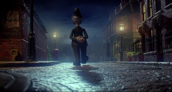 Movie still from “Wallace & Gromit: The Curse of the Were-Rabbit” (2005), directed by Nick Park – A cartoon of a person walking down a street; Wide shot, Low angle