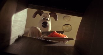 Movie still from “Wallace & Gromit: The Curse of the Were-Rabbit” (2005), directed by Nick Park – Wallace and gromit holding a plate of tomatoes; Close Up shot, Low angle